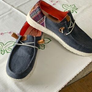 Brand new, never worn hey dude shoes